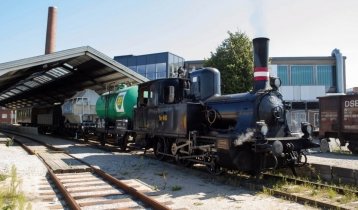 See carriages, locomotives, steam trains, electromotives and omnibuses at the Railroad Museum in Odens, Denmark 